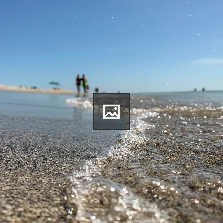 Close-up of small wave at beach