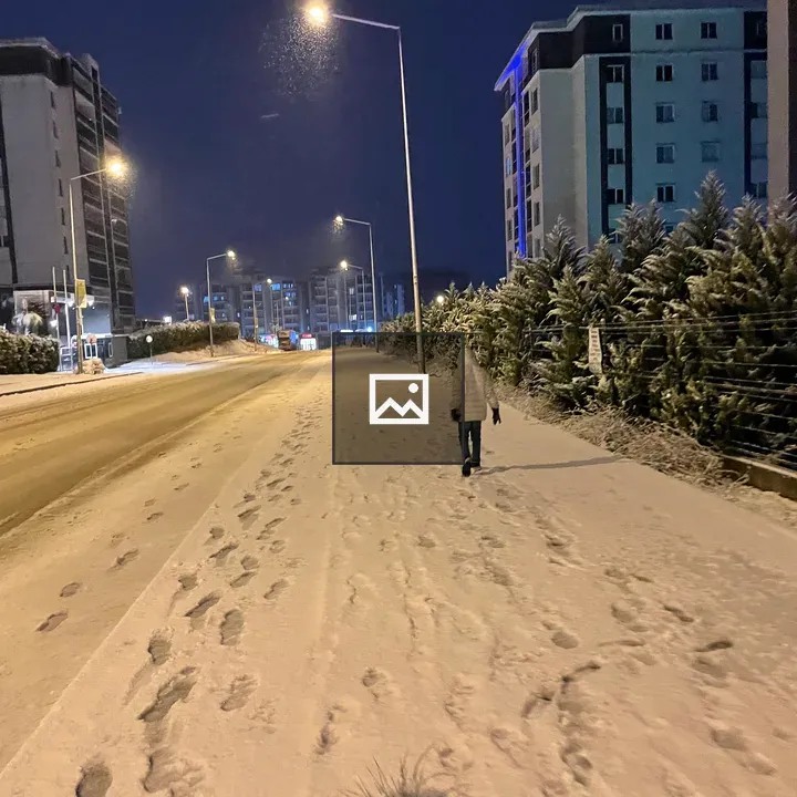 Snow night beside road