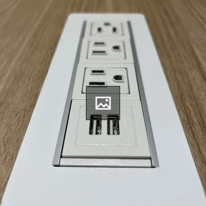 Row of dismayed power outlets