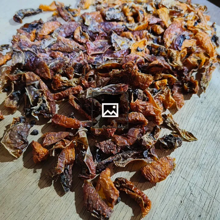 Slices of locoto drying on wood