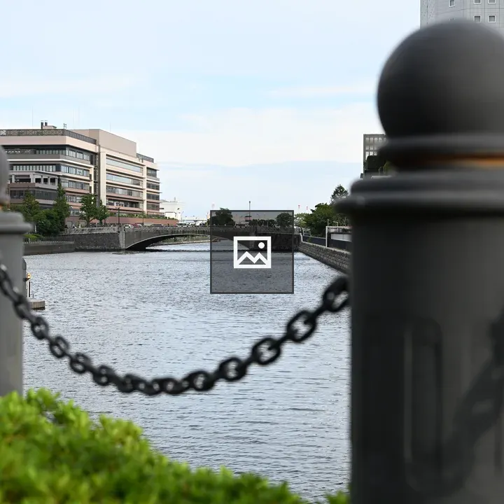 Waterway with Bridge and Fence