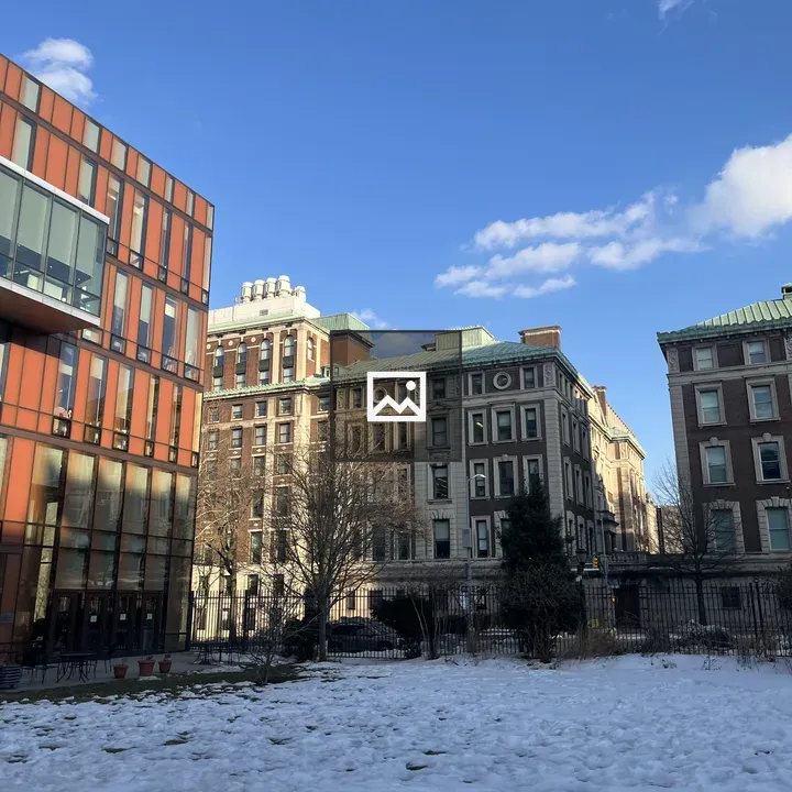 Snow on Ground in Front of Buildings