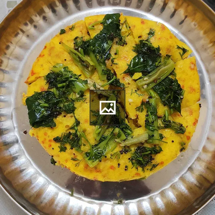 Yellow dish on silver plate