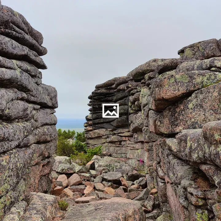 Rock Formations by Wind-Washed Walls