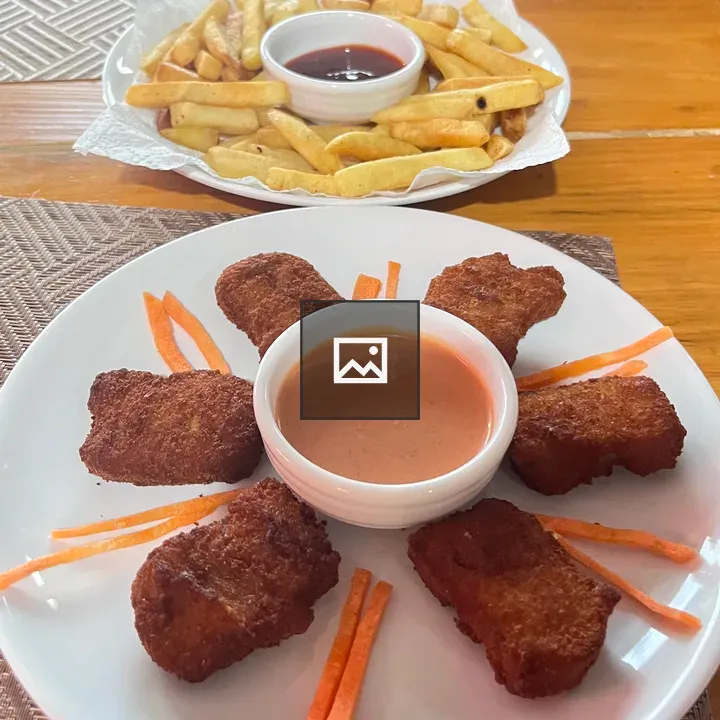 Chicken nuggets plate with dipping sauce