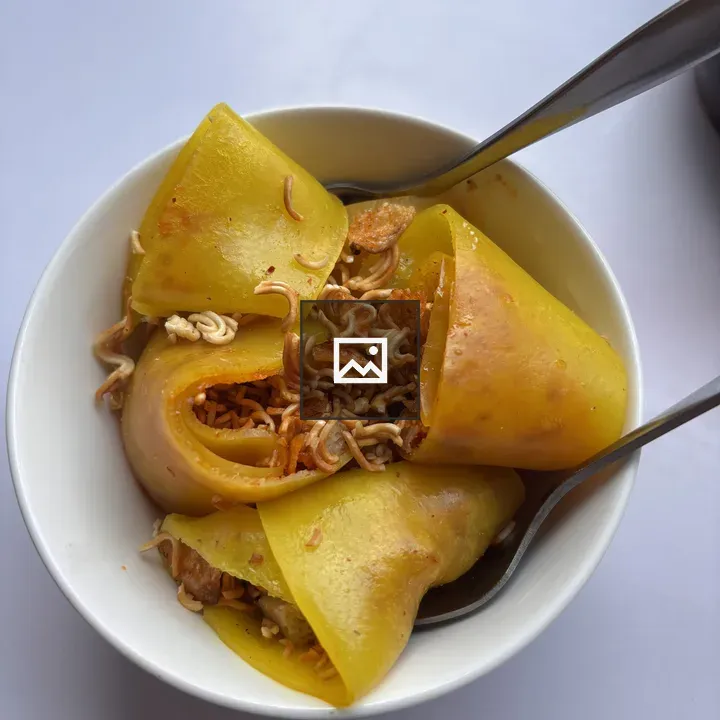Bowl of yellow dumplings