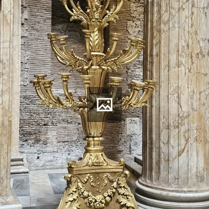 Ornate golden candelabra indoors