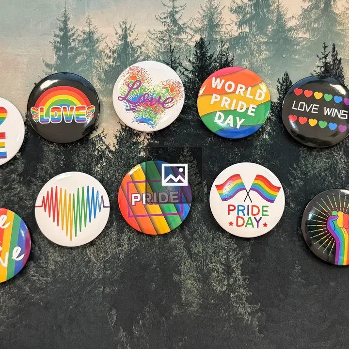 Pride Pins on Desk Arc