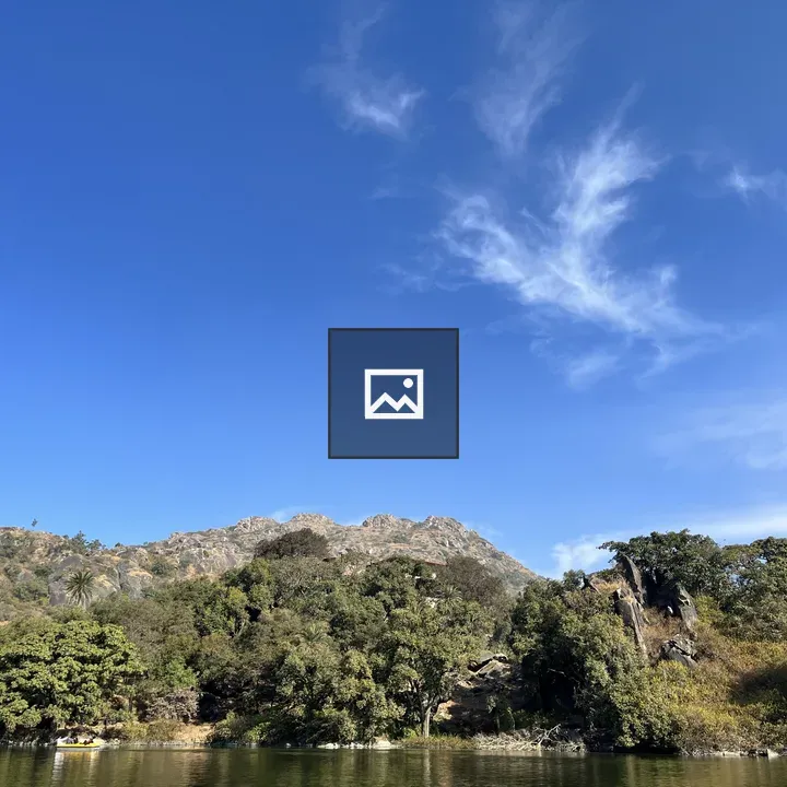 Blue Sky Over Forested Hills