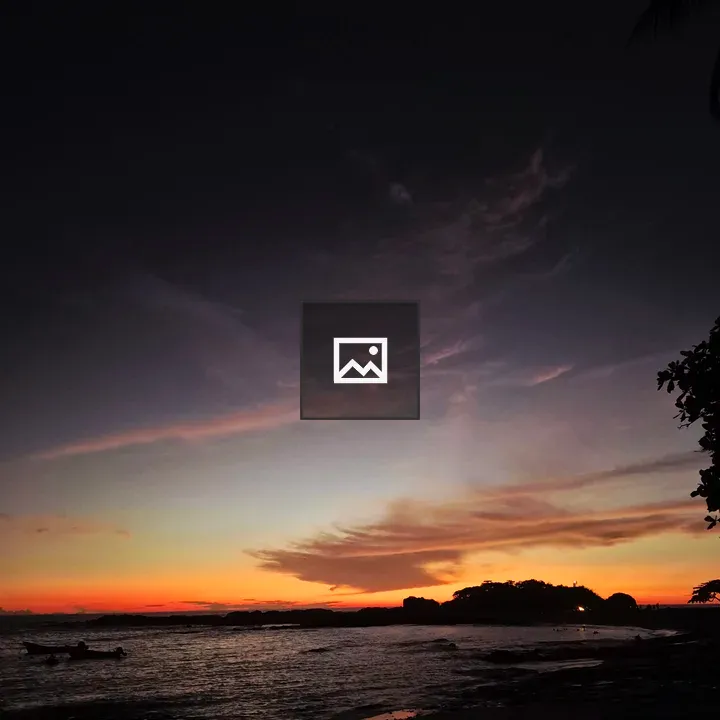 Sunset Beach with Rocks and Island