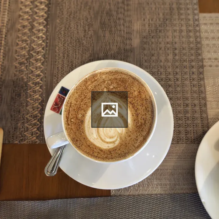 White cup with latte art