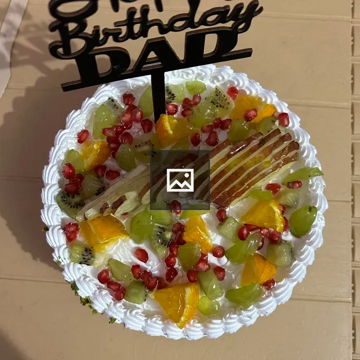 Birthday cake with fruit topping