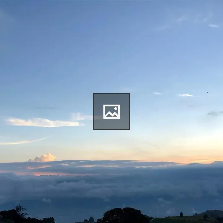 Twilight Sky Over Silhouetted Landscape