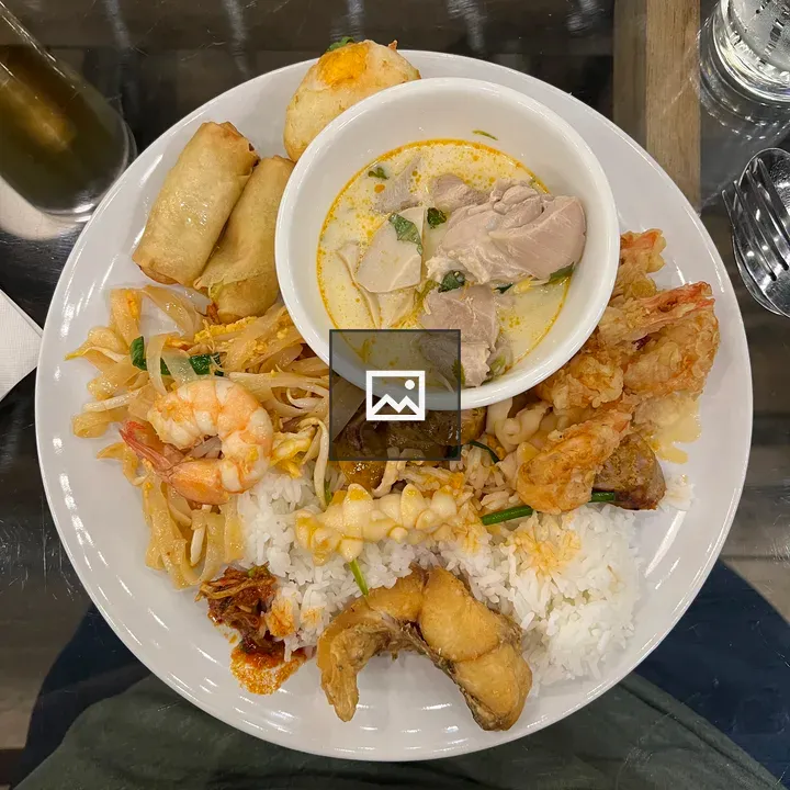 Spring rolls and soup dish in Bangkok