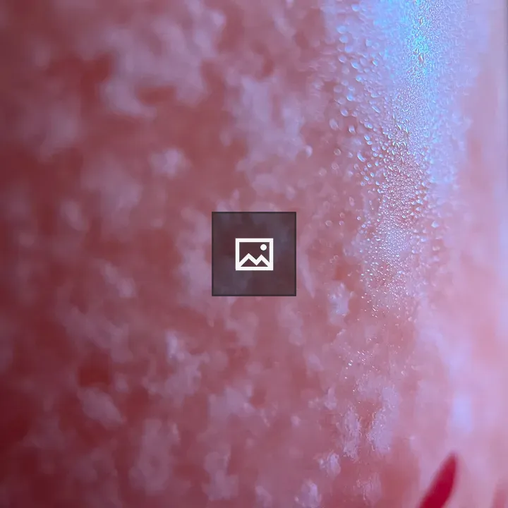 Close up ice crystals on cocktail glass