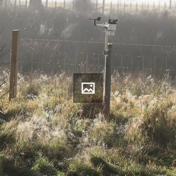 Weather station on wire fence