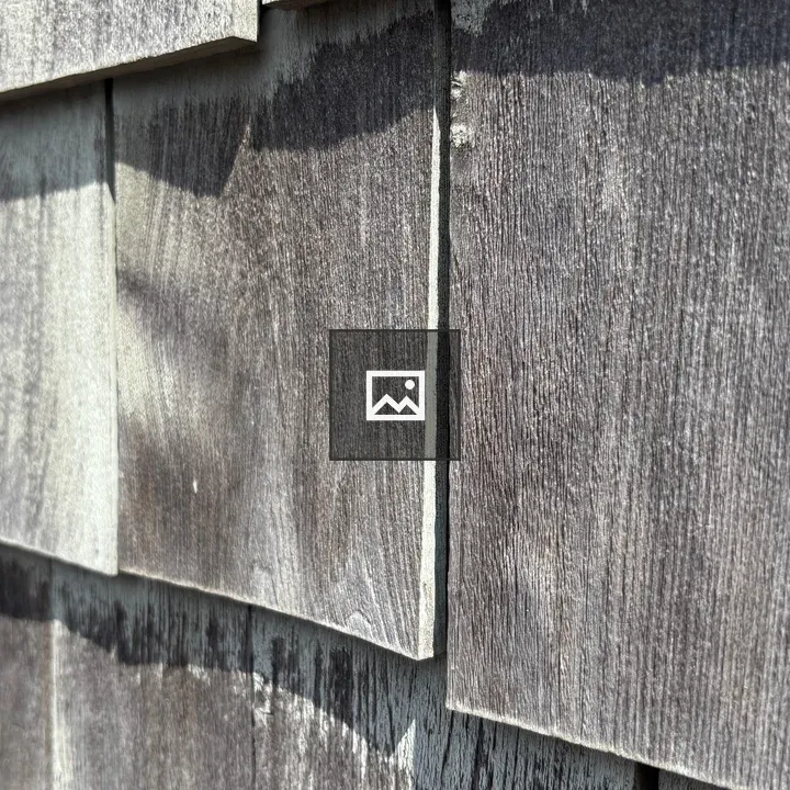 Weathered wood shingles siding