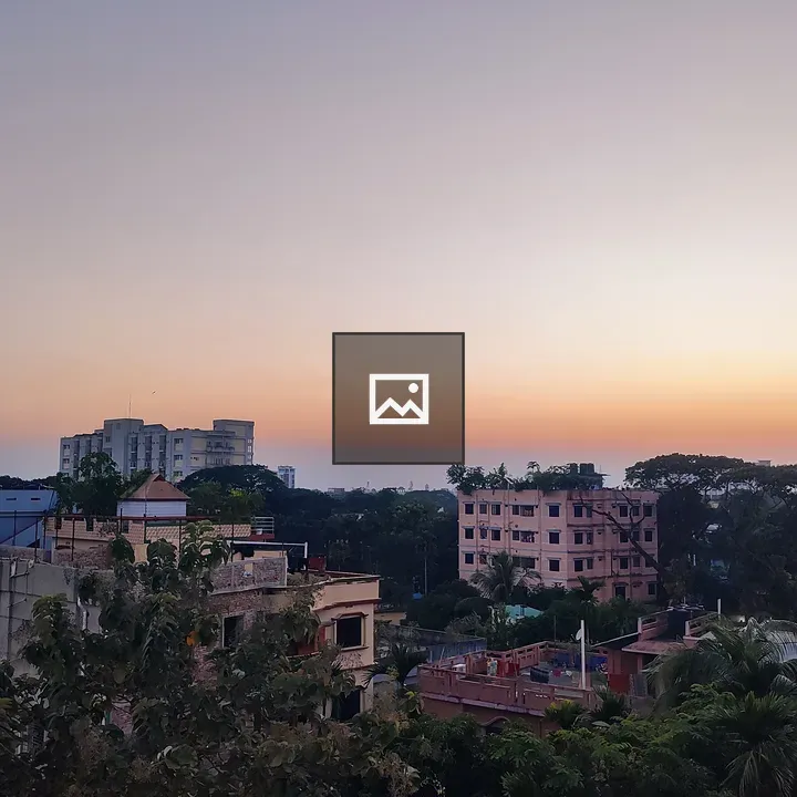 Cityscape at Sunset Over Green Horizon