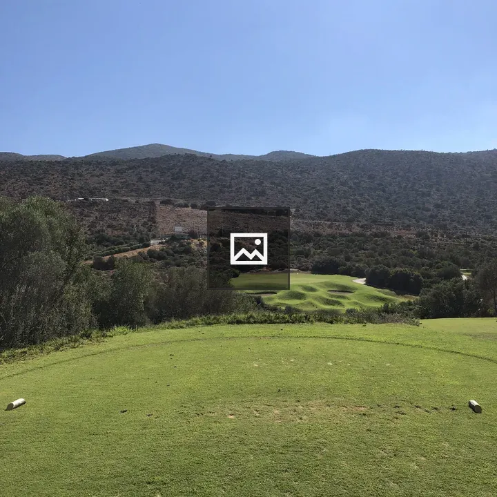 Golf course landscape with blue sky