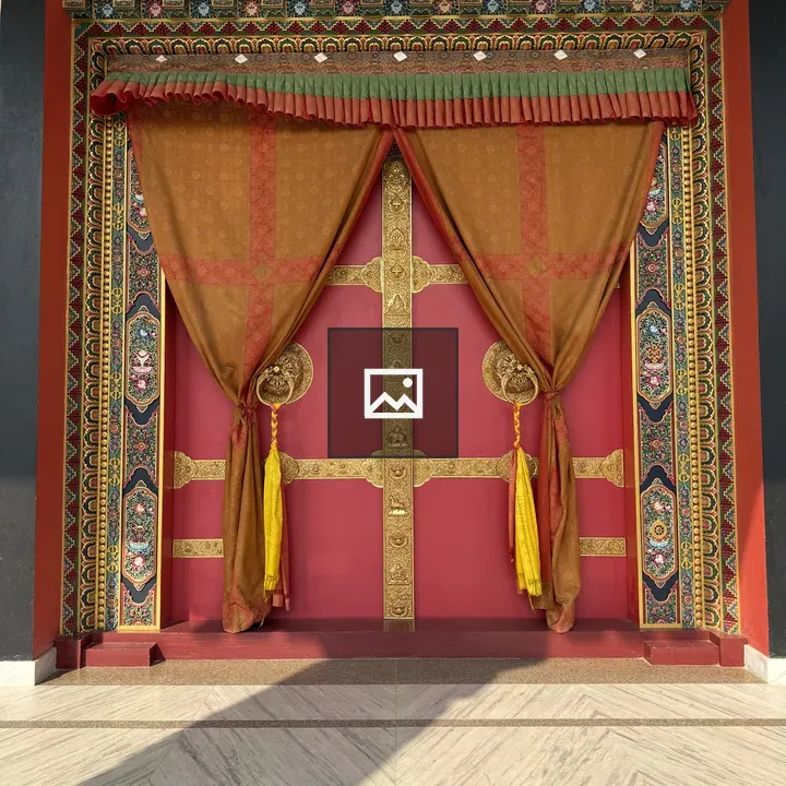 Ornate door with gold accents