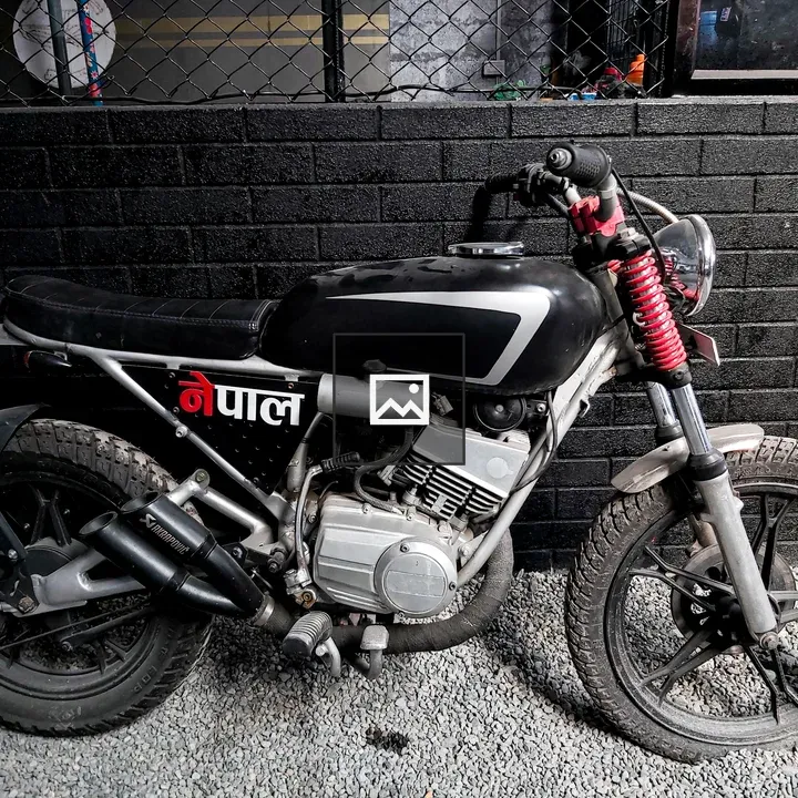 Motorbike by Wall and Fence