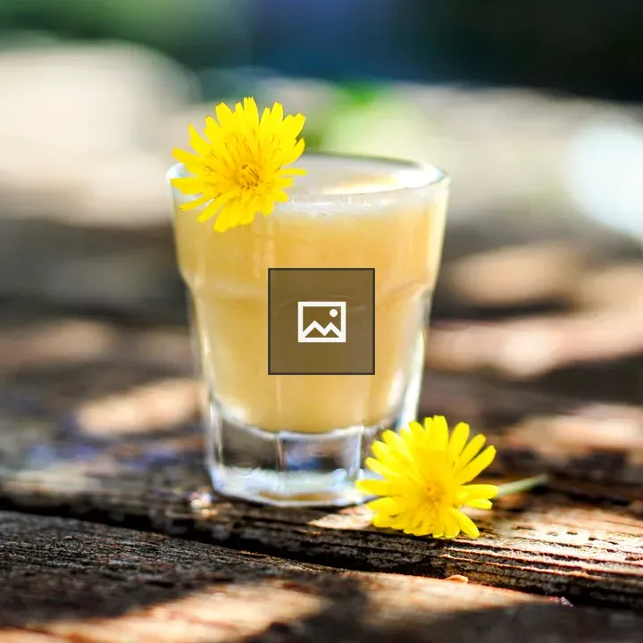 Yellow juice with flower