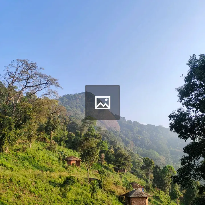 Mountain slope with small homes