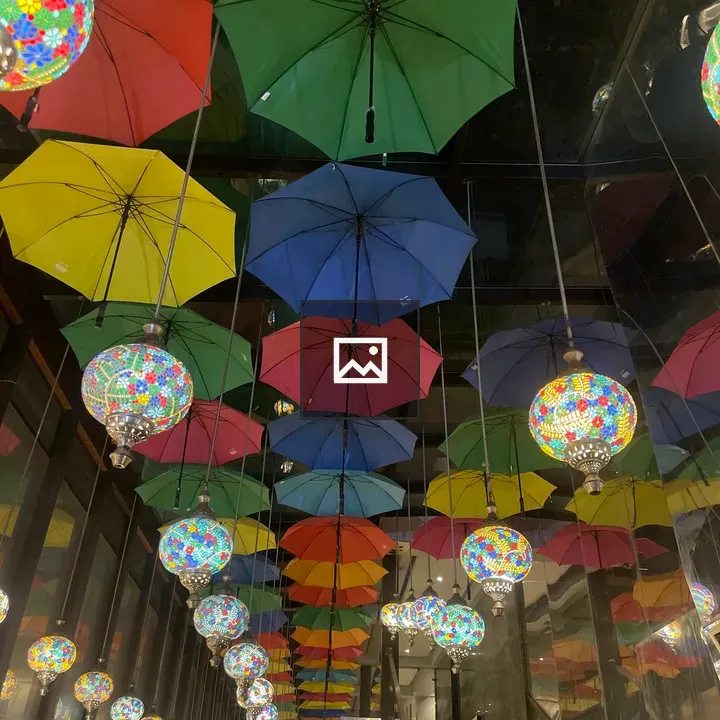 Ceiling with colorful umbrellas and lamps