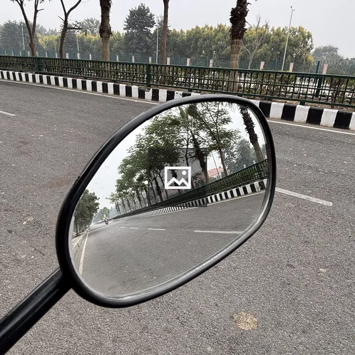 Motorcycle Side Mirror Reflecting Road