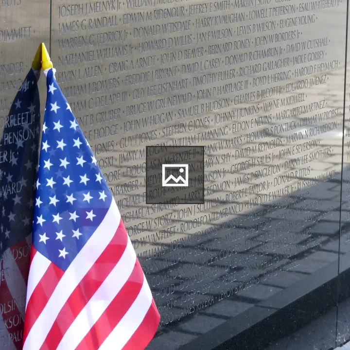 American flag at Vietnam Memorial Wall