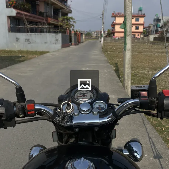 View from a Motorcycle on Quiet Street