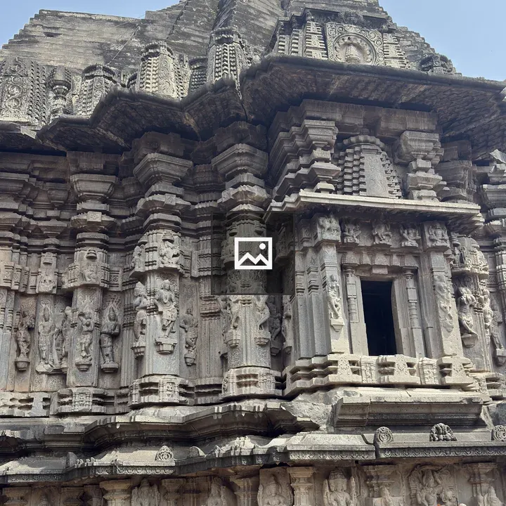 Temple structure with stone carvings