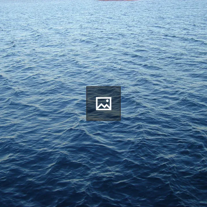 Sea waves on blue water