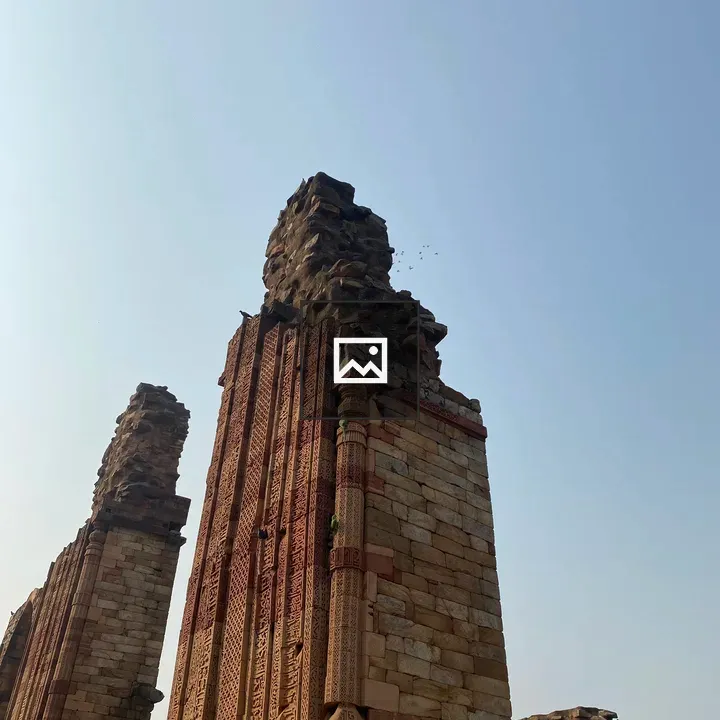 Tall stone ruin with carvings
