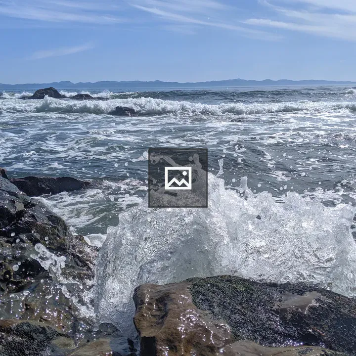 Ocean waves breaking on rocks