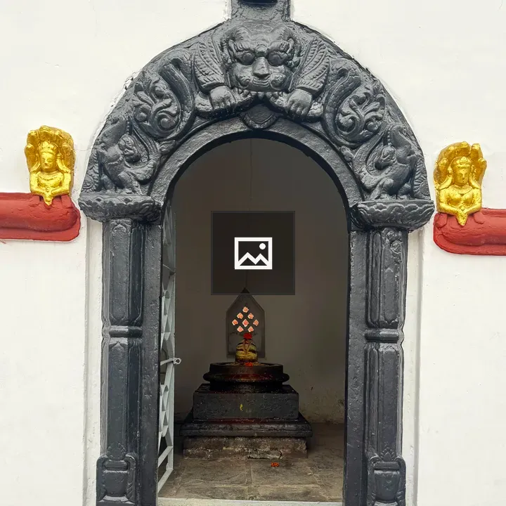Ornate arch with shrine