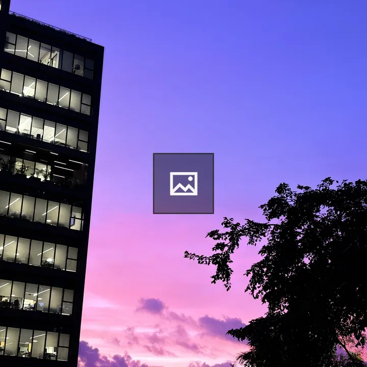 Glass Building Sunset Reflection