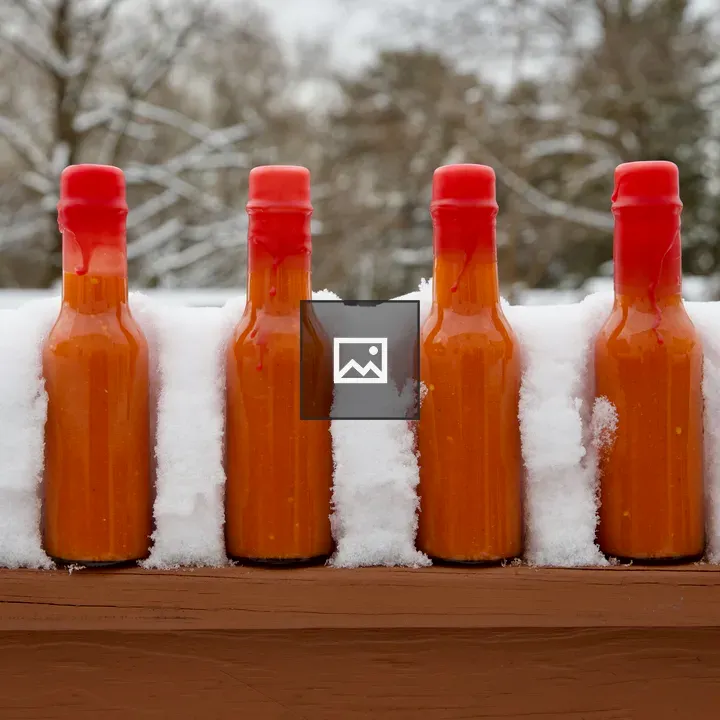 Orange habanero hot sauce bottles