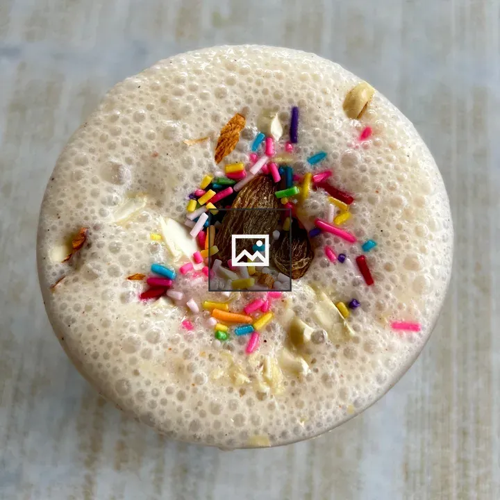 Frothy beverage with sprinkles