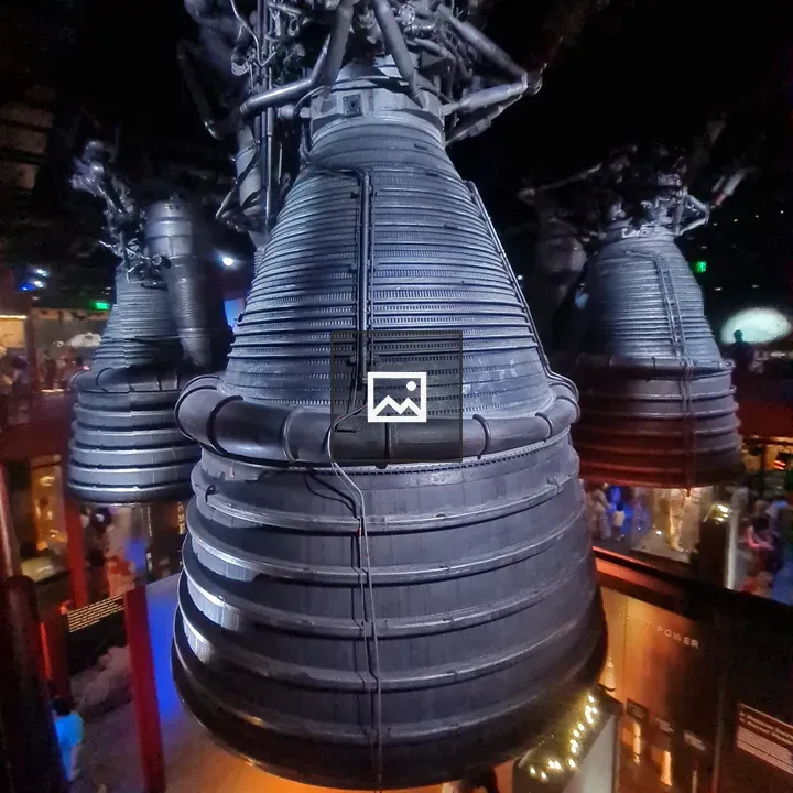Rocket engine exhibit suspended from ceiling