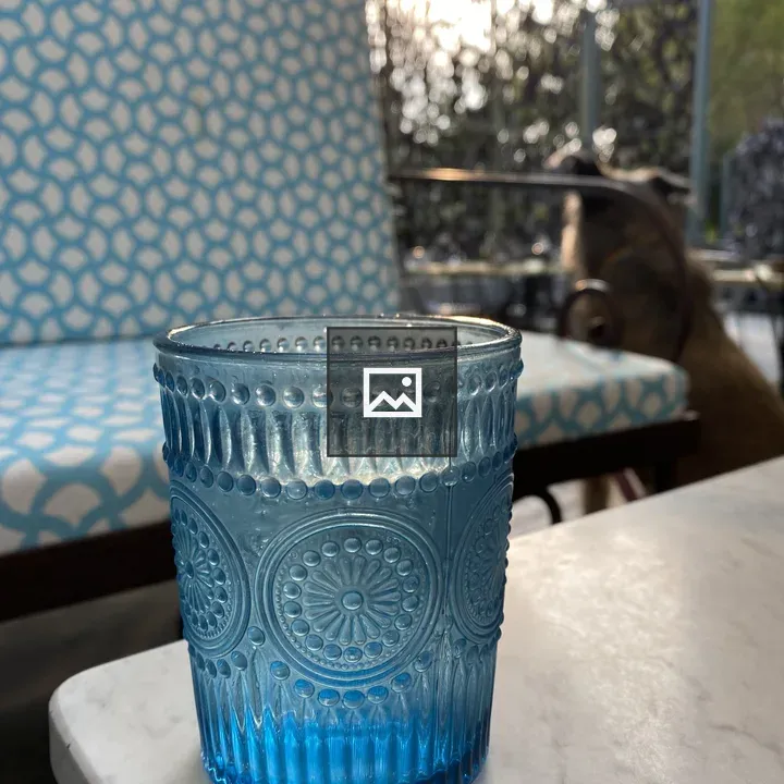 Blue textured glass on marble