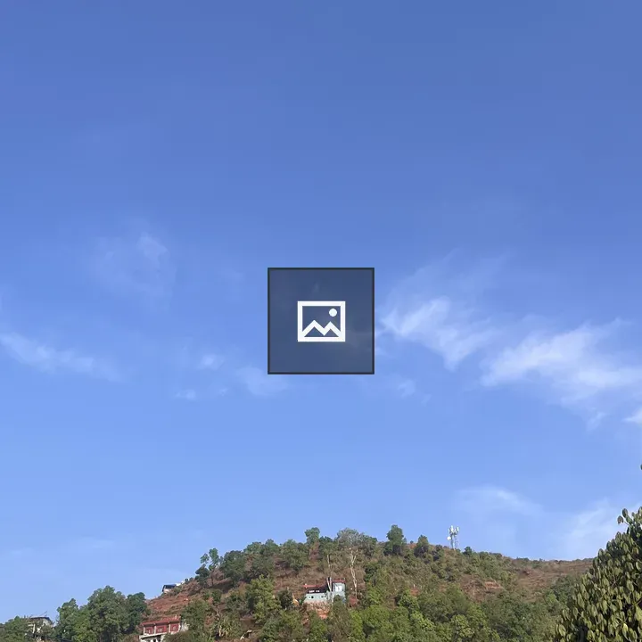 H hillside with trees and houses