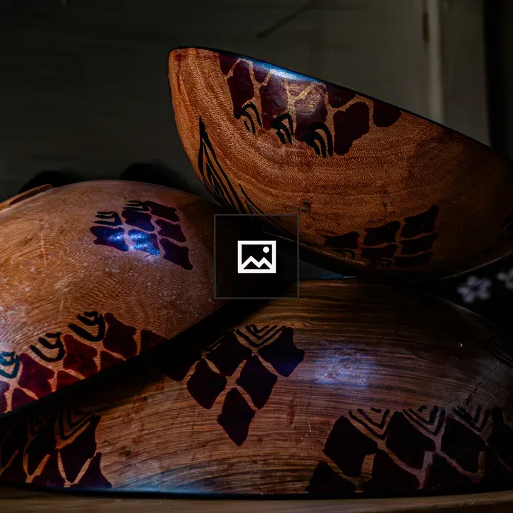 Three stacked wooden bowls