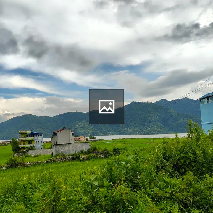 Calm lake with hills and greenery