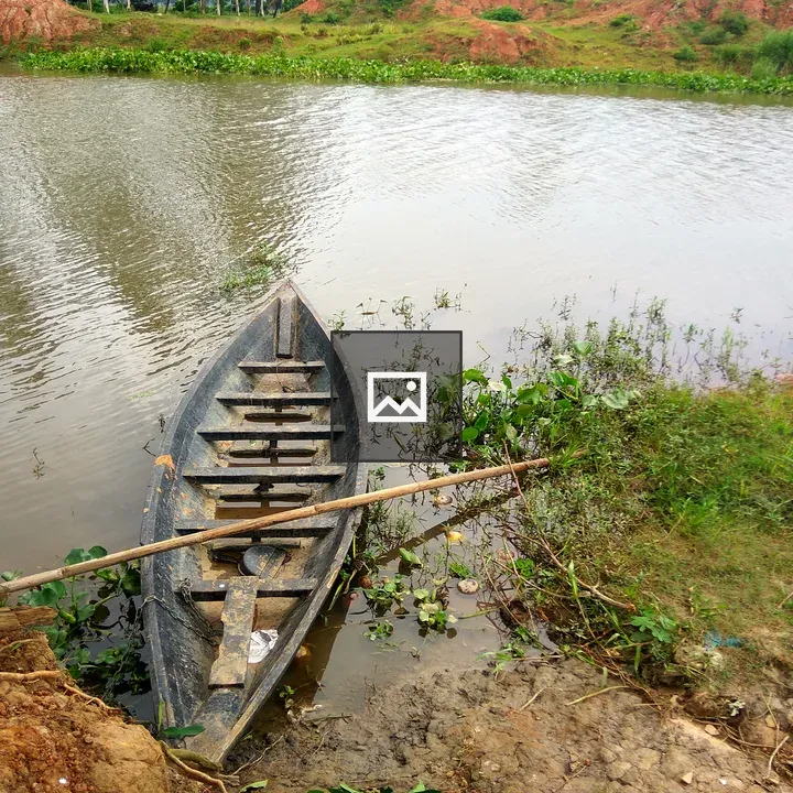 Small Boat on Village Lake