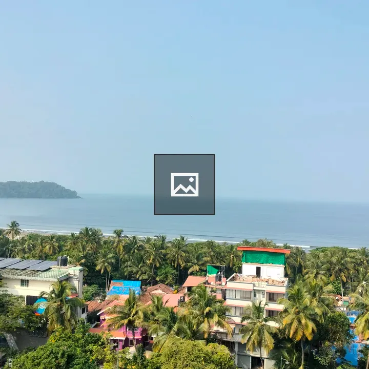 Coastal town with palm row
