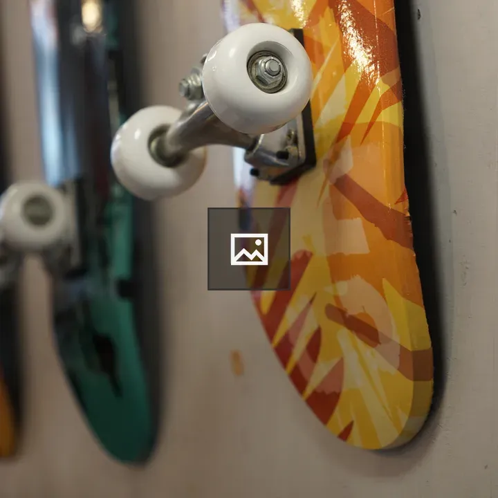 Colorful skateboards on wall