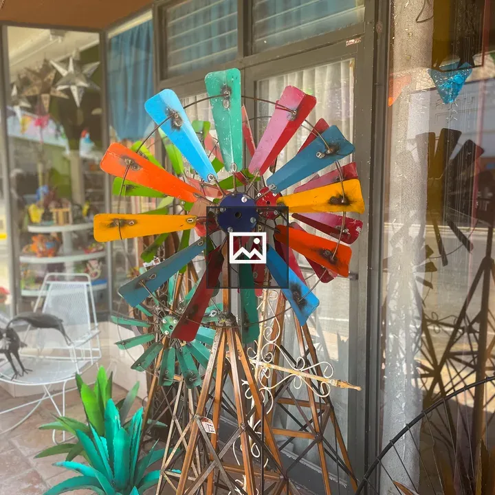Colorful windmill near antique store
