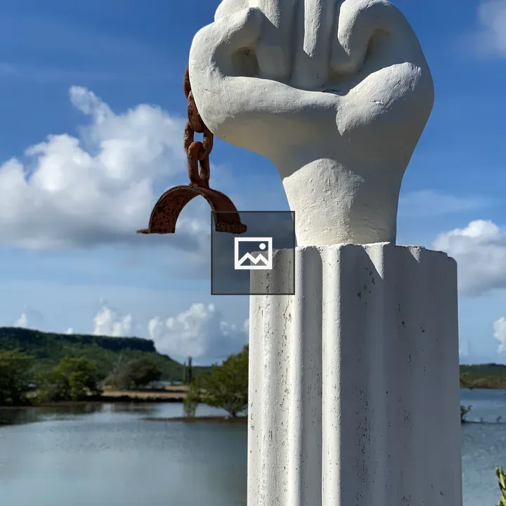 Statue of Fist with Broken Chain