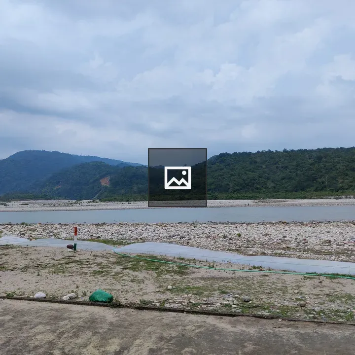 Hill and river in frame